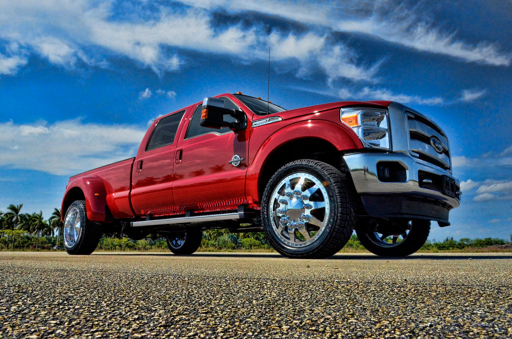 Red Ford Truck on road