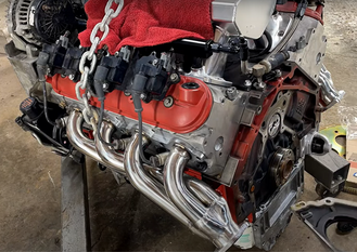 How much HP do headers add to a 5.7 Hemi?